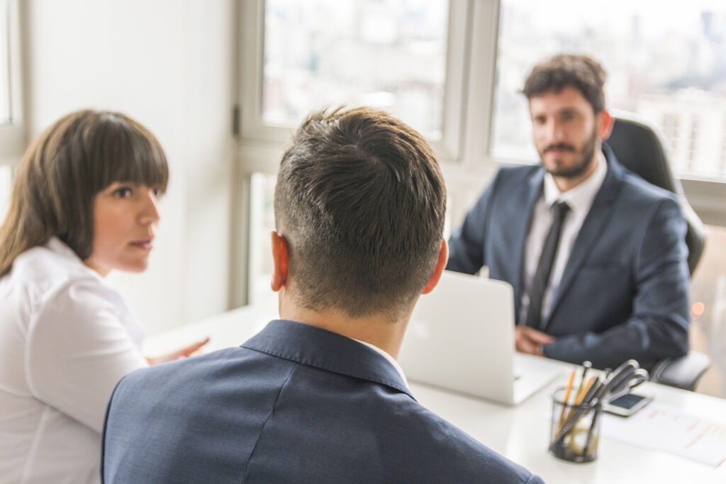 expert probate guidance in olmos park: your trusted legal partner, businessman businesswoman sitting front manager workplace