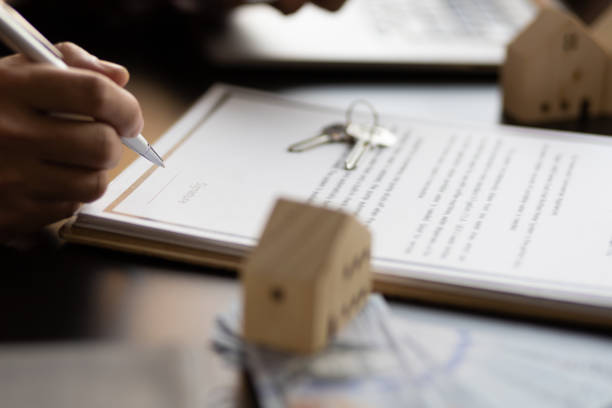 texas is no stranger to land disputes, businessman signing a contract for a purchase agreement mortgage and rental housing
