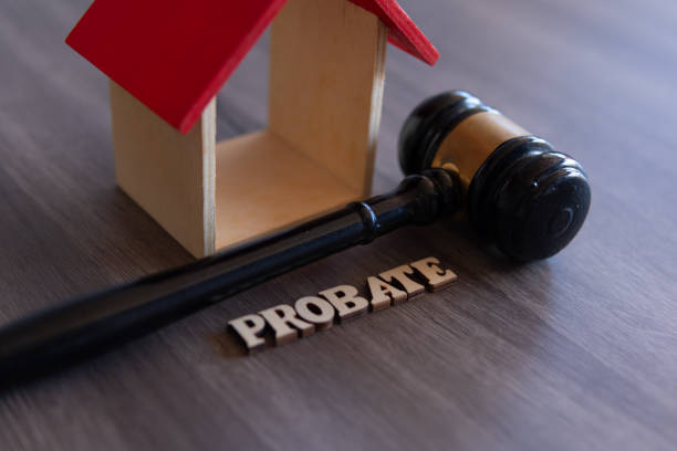 when someone dies in texas, their debts don’t simply disappear, closeup of judge gavel wooden house and word probate