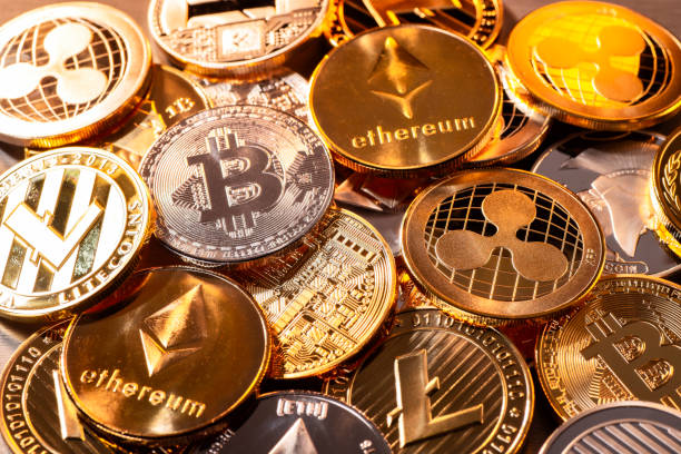 Various cryptocurrency coins, including Bitcoin, Ethereum, and Ripple, representing digital assets relevant to Texas probate law and estate planning.