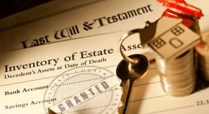 Last will and testament document with "Inventory of Estate Assets" header, a key, a house keychain, and stacks of coins, symbolizing probate process and estate management in Texas.