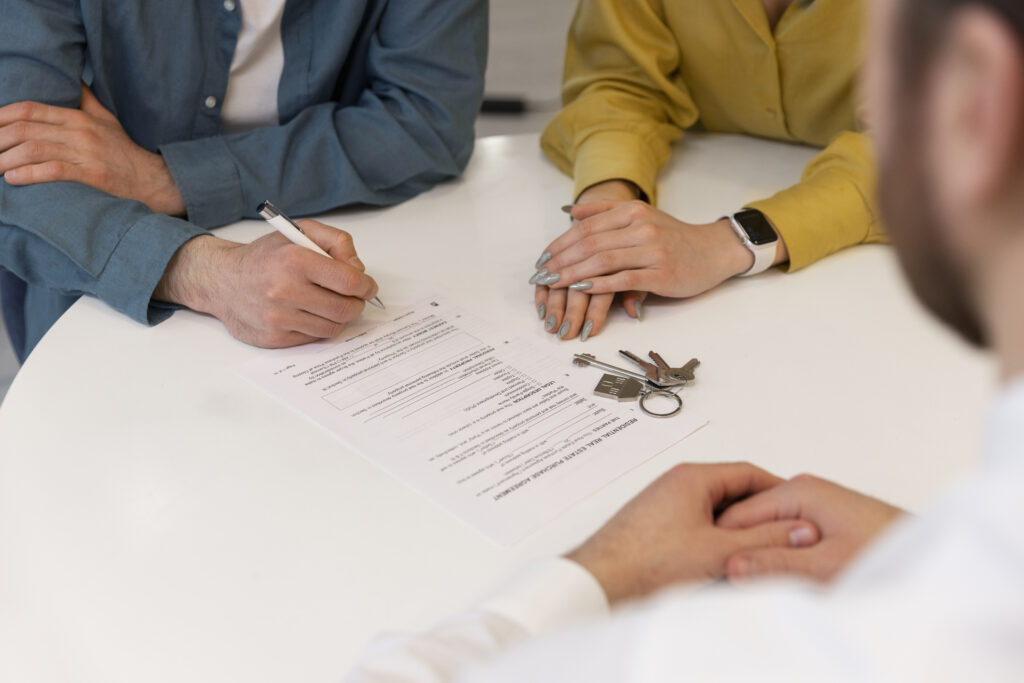 if you’re handling an estate or managing probate litigation, you may eventually need to figure out, male real estate agent doing business showing house potential buying couple