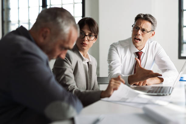 in the aftermath of a loved one’s death, estate administration can be one of the most emotionally and legally complex experiences a family faces, businessman arguing with his colleague on a meeting in the office