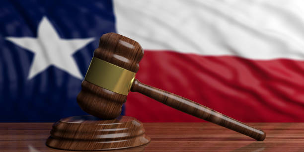 Gavel resting on a wooden surface with the Texas flag in the background, symbolizing legal disputes over inherited property in Texas.