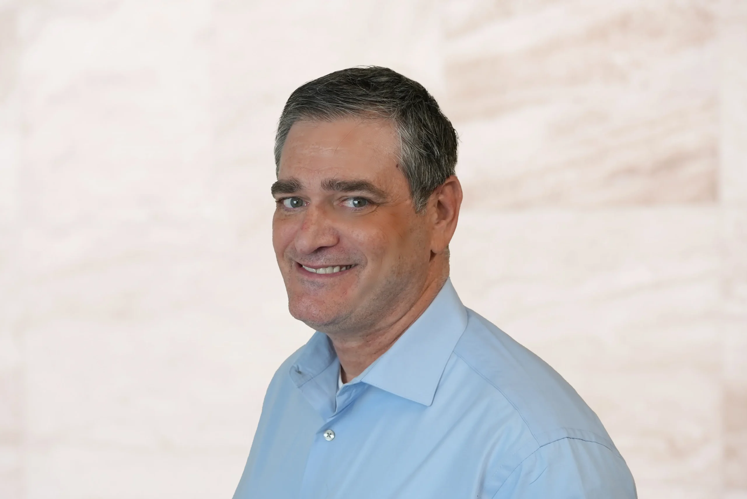 Eric Engel, Dallas attorney at The Law Office of Bryan Fagan, PLLC, specializing in Family Law, Bankruptcy, and Probate, smiling against a light background.